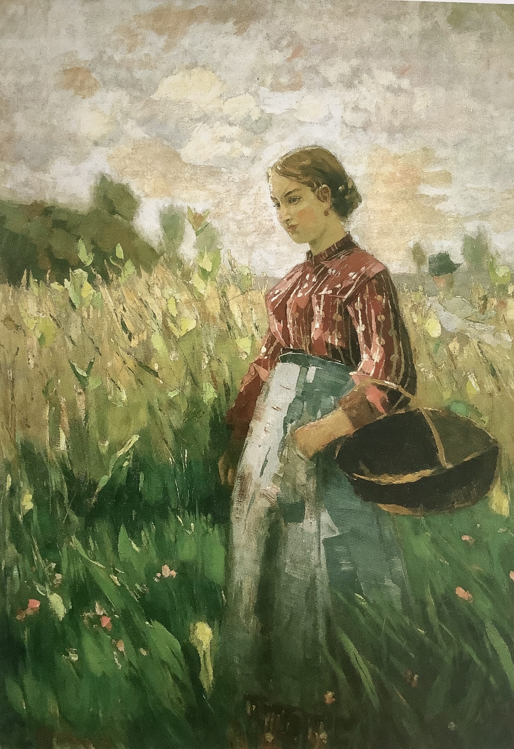 Bäuerin mit Weidenkorb am Feldrand, um 1889